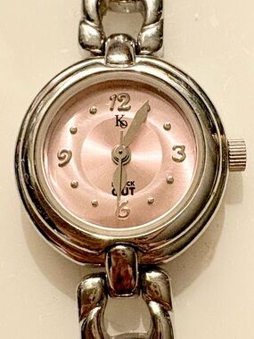 Knock Out Women's Analog Quartz Silver Bracelet Watch
Pink Sunburst Dial